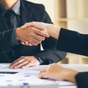 Tu Éxito Empresarial Registro de Empresa Contratista. Close up view of business partnership handshake.Concept two businessman handshaking process.Success Registro de Empresa Contratista
